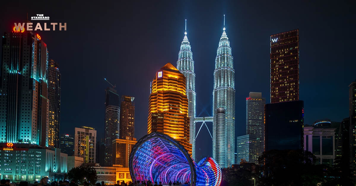 ภาพกราฟและสัญลักษณ์แสดงการเติบโตของเศรษฐกิจมาเลเซีย