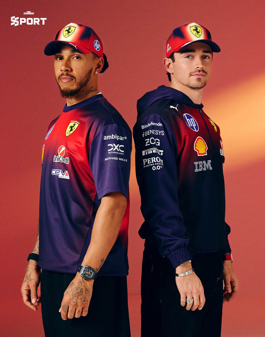 ภาพชุดเสื้อเวอร์ชันพิเศษของทีม Ferrari สีม่วงเข้ม พร้อมโลโก้ทีมและสปอนเซอร์ ออกแบบโดยได้แรงบันดาลใจจาก 'ม้าไฟ' ต้อนรับ Chinese Grand Prix ฤดูกาล 2026 1