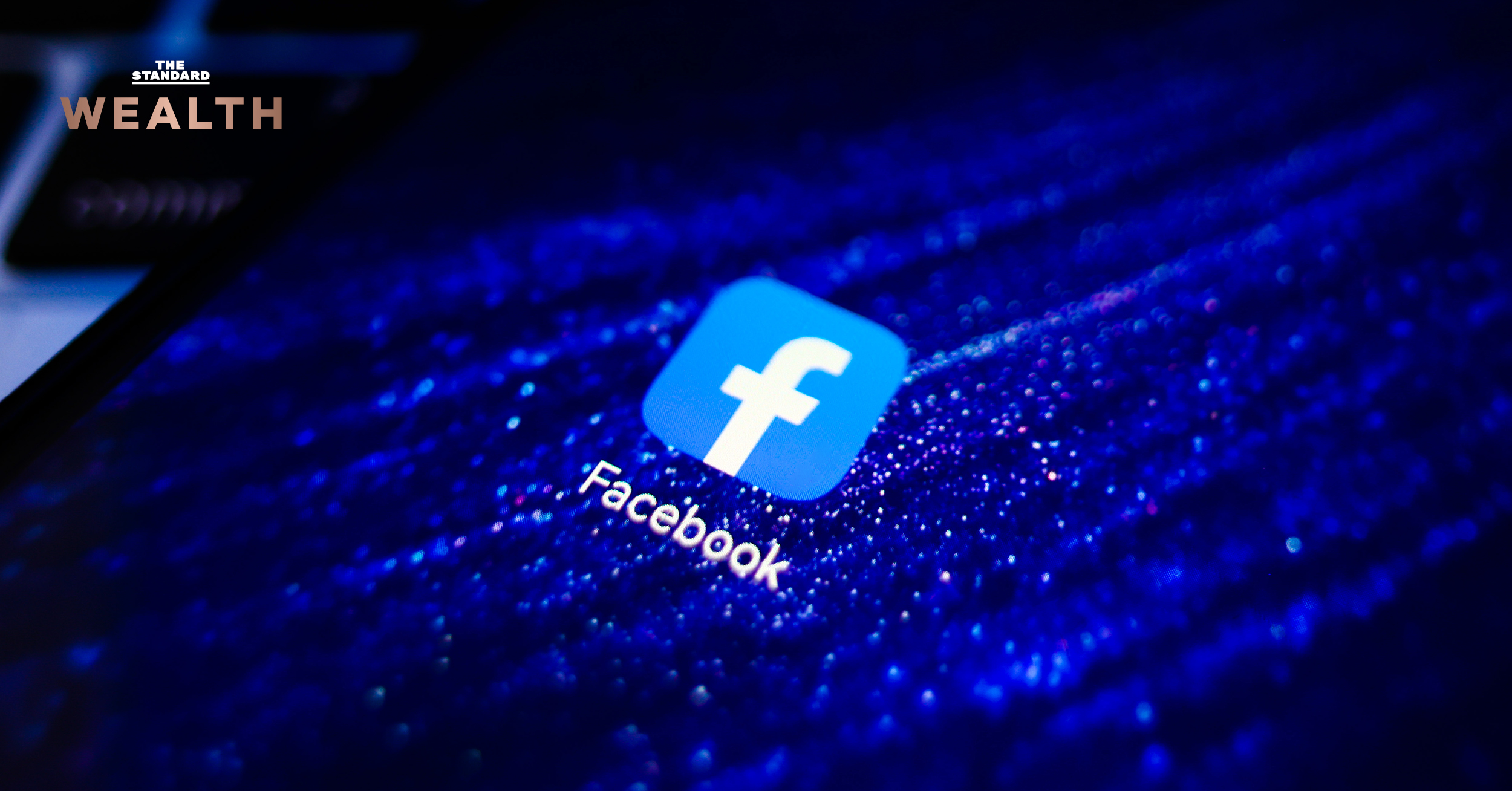 มือถือกำลังแสดงโลโก้ Facebook