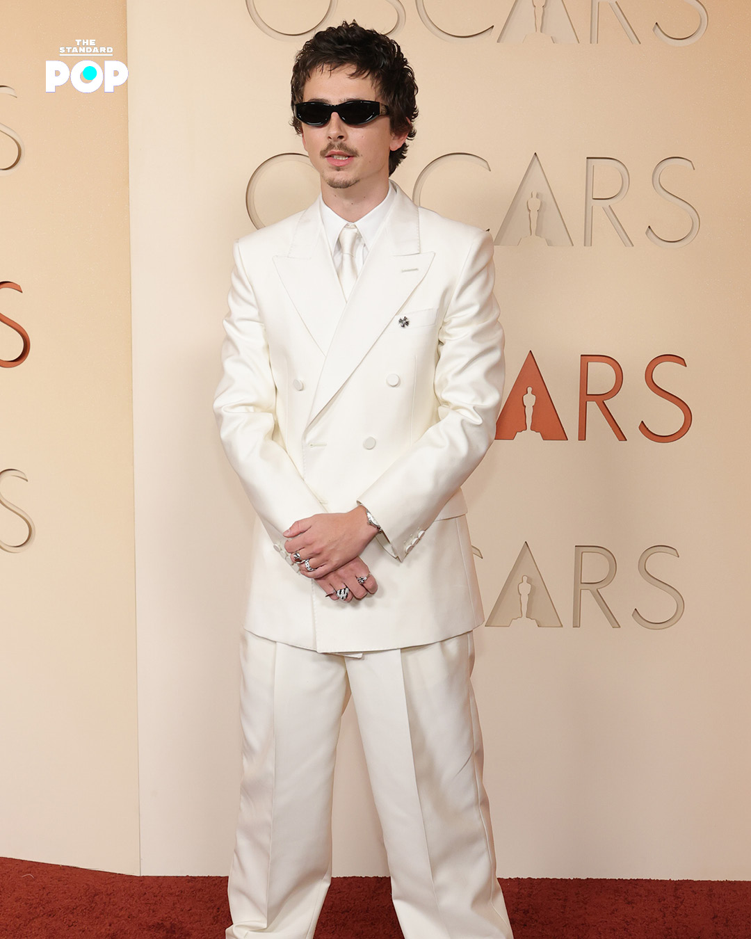 Elle Fanning ในชุดเดรสสีชมพูอ่อนเดินพรมแดงงาน Oscars 2026 1