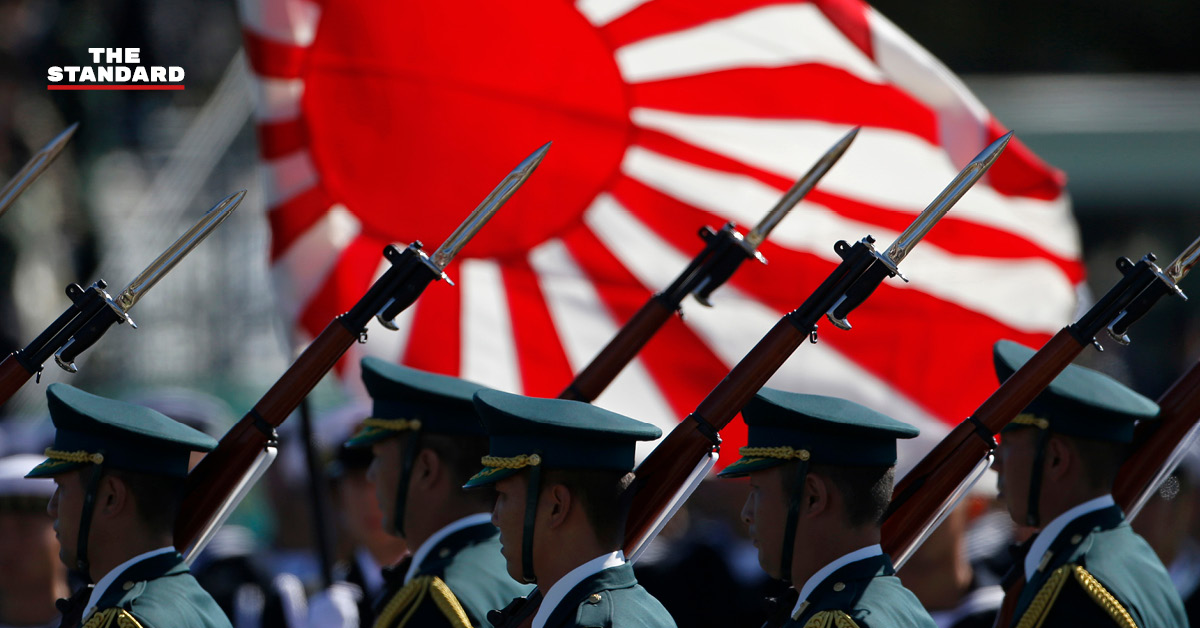 ธงชาติญี่ปุ่นและอาวุธยุทโธปกรณ์ สื่อถึงการปลดล็อกส่งออกอาวุธของญี่ปุ่น