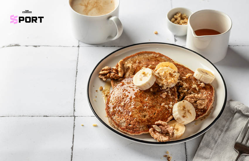 โยฮันเนส ฮอสโฟลต เคลโบ นักสกีโอลิมปิกชาวนอร์เวย์ กำลังแข่งขันสกีครอสคันทรีด้วยความมุ่งมั่น 2