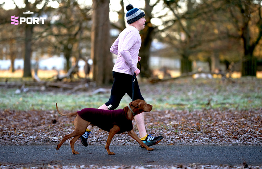 นักวิ่งออกกำลังกายร่วมกับสุนัขคู่ใจในกิจกรรมวิ่ง 6