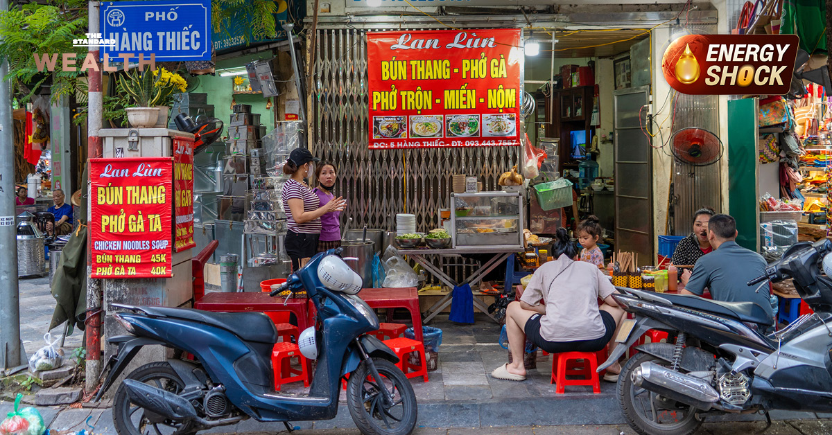 ภาพแผงขายของในตลาดเวียดนาม พร้อมกราฟิกแสดงตัวเลข GDP เวียดนามโต 7.83% ชะลอตัว แต่นายกฯ ยันไม่ทิ้งเป้า 10%