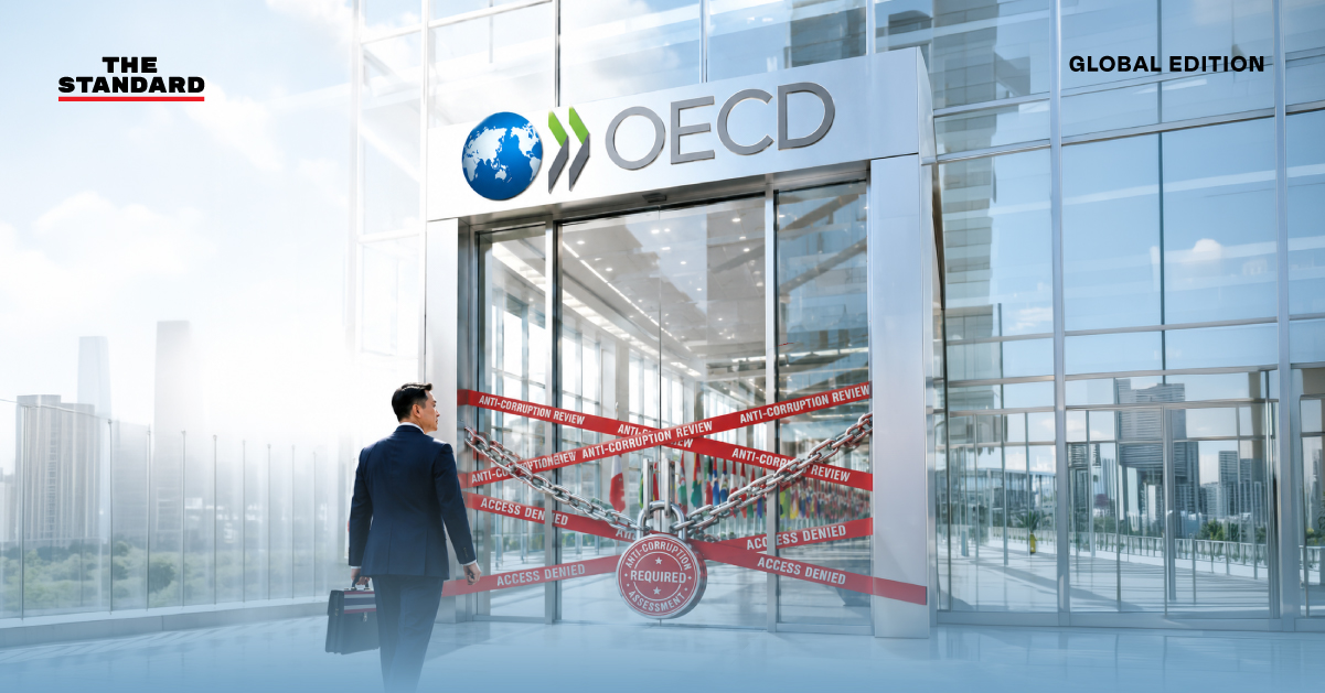 ประตูทางเข้า OECD ถูกกั้นด้วยเทปแดง สื่อถึงปัญหาคอร์รัปชันที่ขัดขวางประเทศไทย