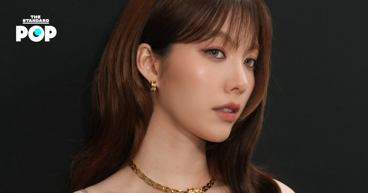 ออม กรณ์นภัส ในชุดสีขาว
