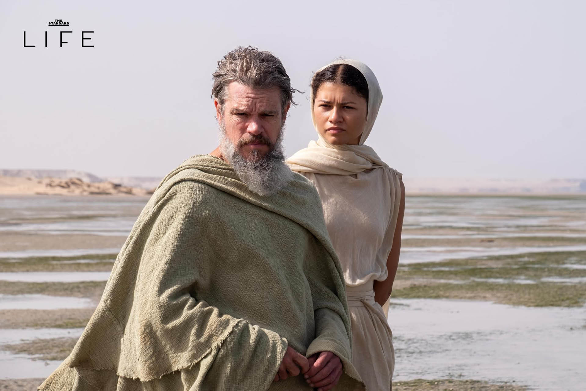 ภาพโปสเตอร์ภาพยนตร์ The Odyssey พร้อมชื่อ Christopher Nolan และข้อความเกี่ยวกับสถานที่ถ่ายทำ 1