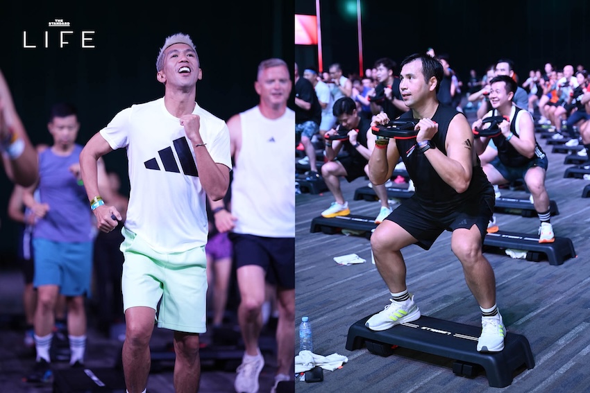 ภาพบรรยากาศงาน LES MILLS LIVE Bangkok 2026 x adidas ที่มีผู้คนจำนวนมากกำลังออกกำลังกายในฮอลล์ขนาดใหญ่ 10