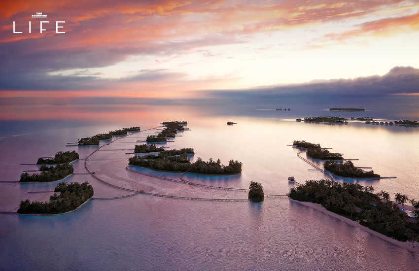 ภาพมุมสูงของ Amanolu รีสอร์ตหรูในมัลดีฟส์ แสดงให้เห็นวิลล่าพร้อมเกาะส่วนตัวและน้ำทะเลสีคราม 3