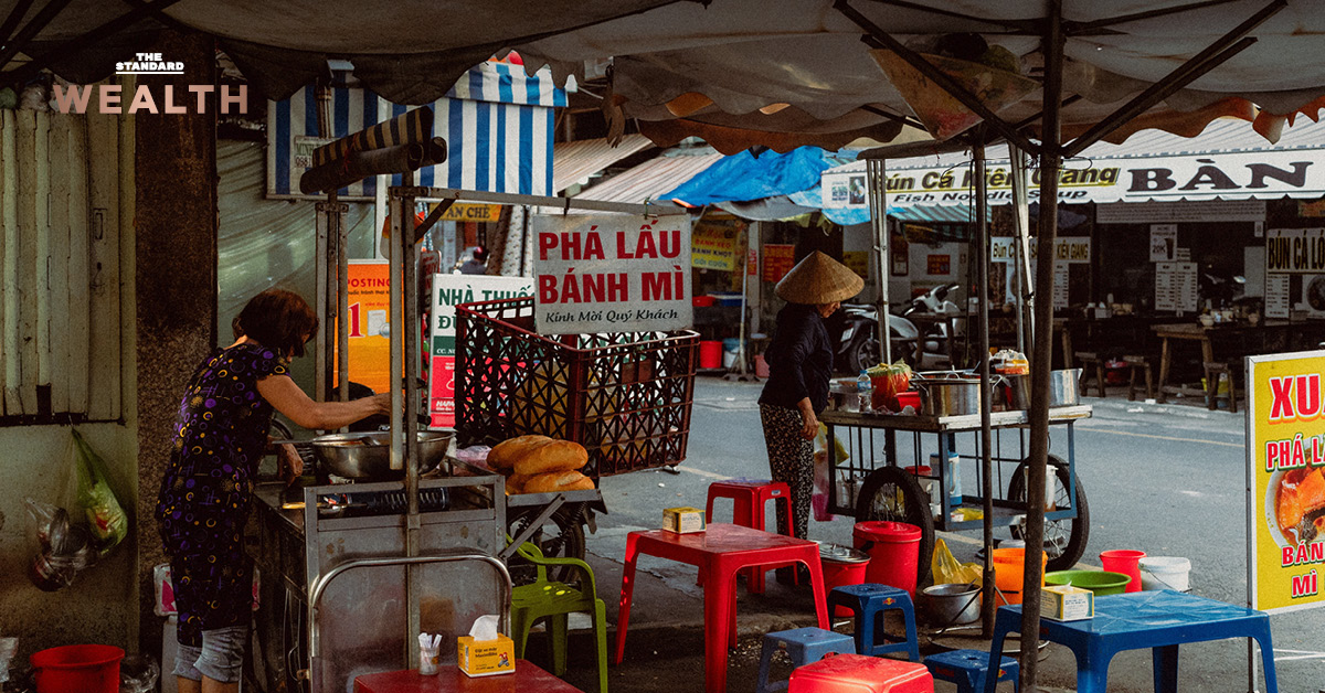 ภาพมุมสูงของเมืองโฮจิมินห์ ประเทศเวียดนาม พร้อมข้อความแสดงตัวเลข GDP เวียดนามไตรมาส 3 เติบโต 9.95%